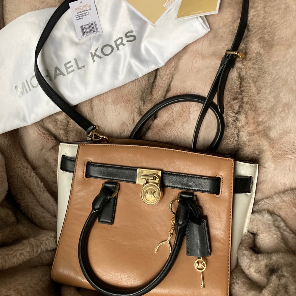 SOLD Michael Kors Satchel black, tan, ivory with Charm
